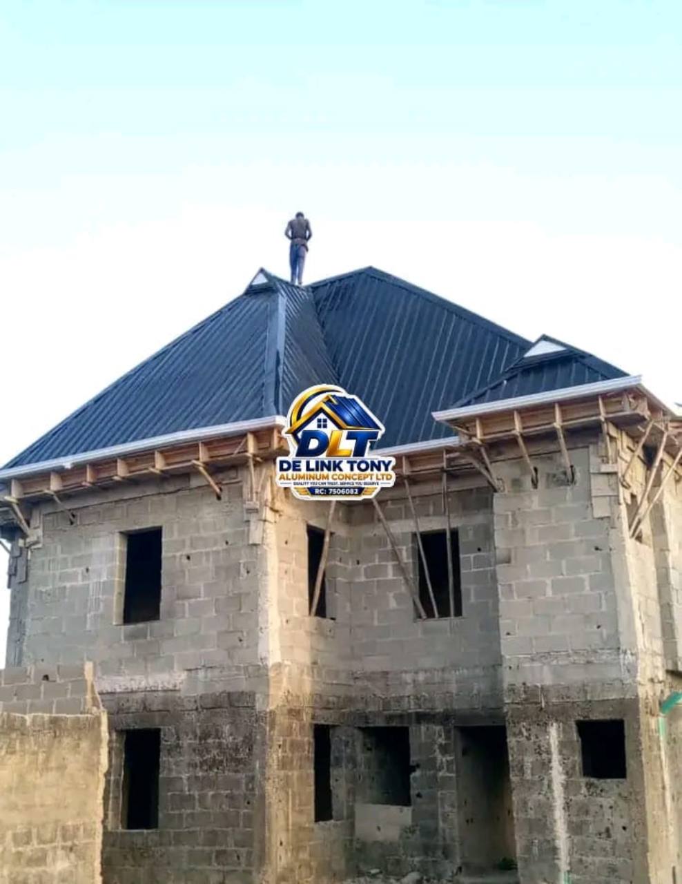 Dark long-span roof on a two-storey residential building