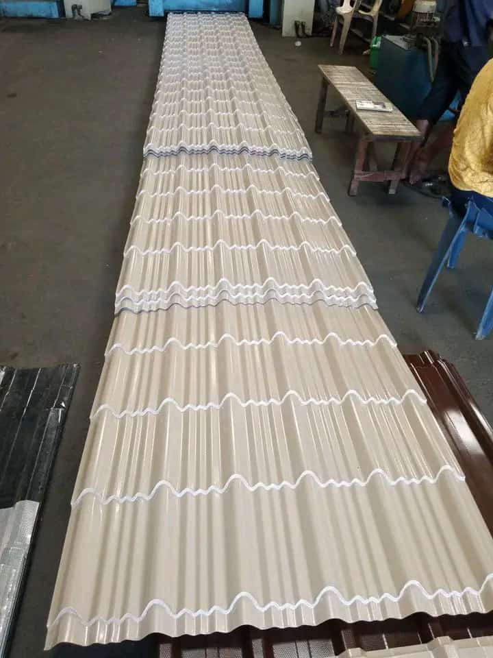 Cream roofing sheets with a stepped tile profile